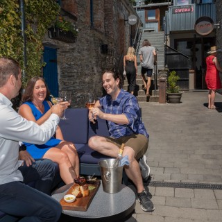 Diners in Arrowtown Alley 